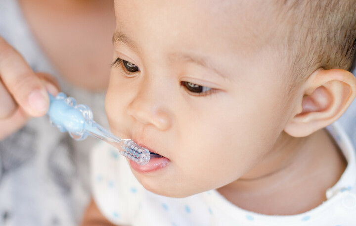 How should I care for baby’s first teeth?